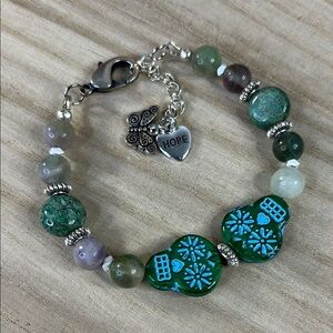 Silver and Green Skull Beaded Bracelet